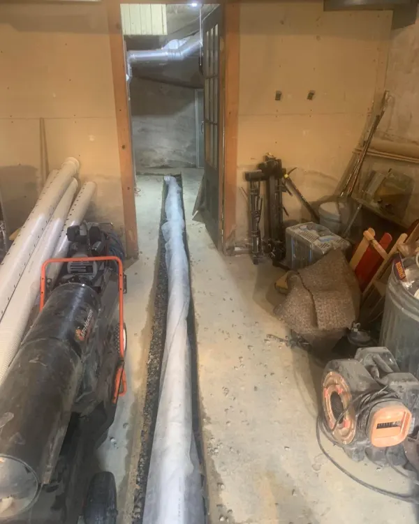 Drain pipe laid in a basement trench